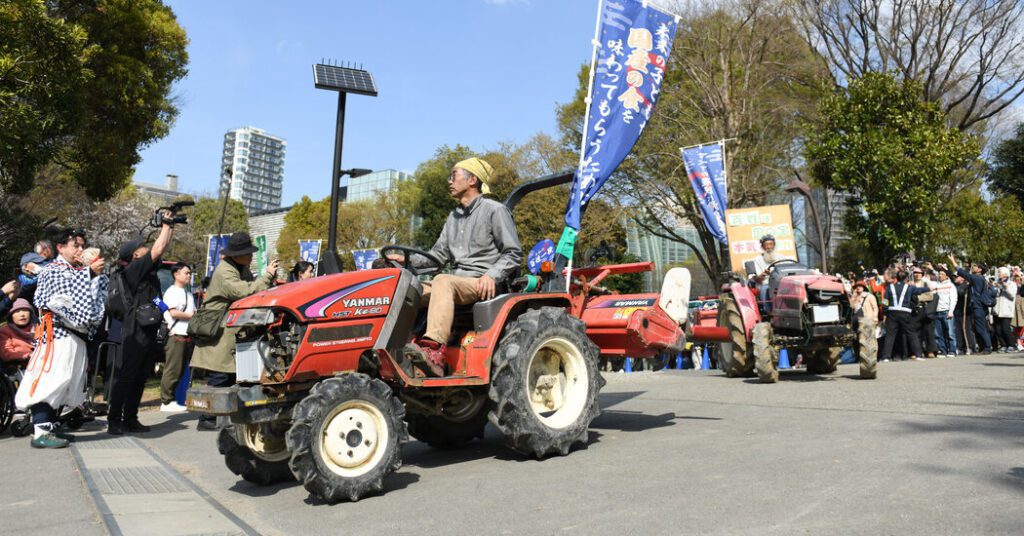 In tokyo, rice farmers are protesting "misplaced" rules that promote