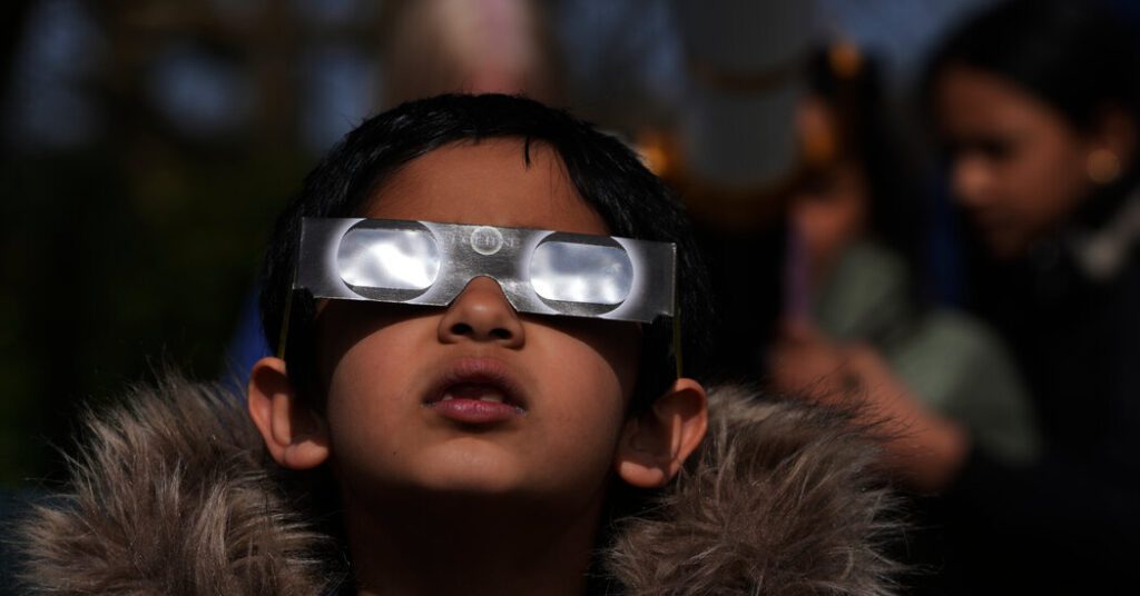 Partial solar eclipse attracts much of the northern hemisphere