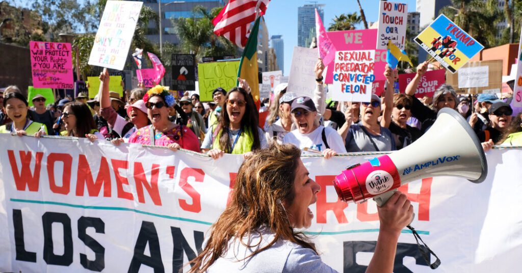 Thousands gather to protest trump on international women's day